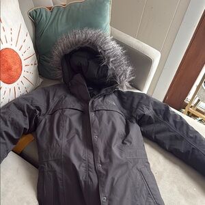 NorthFace Woman’s Arctic Parka, medium grey slate color. Good Used condition.